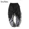 Una reta man broek mode streetwear stiksel kleur joggers hiphop lange broek mannen elastische taille vrachtpak mannen 201126