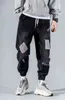High Street Fashion Mens Jeans Drawstring Black Personal Designer Printed Denim Pants Men Punk Pants Loose Trousers G0104