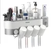Supporto per spazzolino da parete Dentifricio Spremiagrumi Dispenser automatico Accessori per il bagno Imposta Storage Organizer Rack Box LJ201204