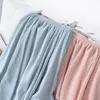 Falda Midi elegante de Color sólido para mujer, faldas irregulares de lino y algodón plisadas de cintura alta coreanas para mujer, verano 2020 LJ200820