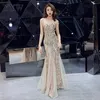 Shinny Gold Sequined V Neck Sleeveless Elegant Evening Dresses Sexy Robe De Soiree Formal Dress Luxury Mesh Club Party Vestidos LJ201124