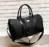 Sac de voyage en nylon noir de haute qualité pour hommes Sacs polochons Triple poignée pour hommes Bagages Gentleman Business Fourre-tout Sacs à main avec bandoulière taille 45 * 25 * 18 cm en gros