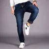 Jeans da uomo Design classico Pantaloni elasticizzati in vita elasticizzata in denim elasticizzato da uomo Taglie forti 5XL 6XL 48 Vestibilità regolare