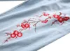 Modne męskie kwiaty dżinsowe haft szczupły dopasowanie proste swobodne dżinsy męskie men dżinsowe spodnie podarte hole homme pant275l