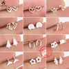 Stud Real 925 Sterling Silver Heart Pendientes para Mujeres Coreano Pequeños Dolphins Snake Flow Flow Flowing Jewelry Accessorie