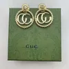 Hot Charm Earrings Gujia / gjia Hot classic tiger head double G letter ring hollowed out rope net red same