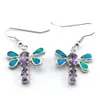 Gioielli con pietre CZ; ciondolo e orecchini alla moda con disegni di farfalle messicane con opale di fuoco