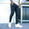 Pantaloni da jogger da uomo della moda fitness pantaloni per bodybuilding pantaloni pantaloni in bianco e nero pantaloni streetwear plus size 47779788