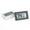Termometro ambientale LCD digitale mini bianco / nero all'ingrosso Igrometro Misuratore di temperatura di umidità nella ghiacciaia del frigorifero della stanza Spedizione gratuita juchiv