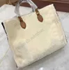 Teddy ONTHEGO MM Tote Bag Fourrure On the Go Shearling Fleece Giant Monograms pattern Womens Designer Luxurys Hiver Laine Sac à main