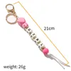 2022 Nouvelle fête des mères Cadeau Leopard Print Silicone Wood Bead Mama Keychain Keychain pour maman