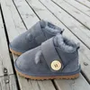 2020 New Boutique Kids Botas de nieve de invierno Niños Cuero de oveja y zapatos de piel de oveja real natural Niñas Niños Ropa de nieve Botas cálidas LJ201029