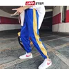 LAPPSTER Hombres Streetwear Joggers Pantalones para hombre Harajuku Hip Hop Sweartpants Male Side Striped Joggers Spring White Track Pants 201110