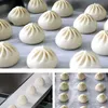 Kommersiell automatisk Baozi Making Machine ångad fylld bullemaskin Imiterande manuell multifunktionell ångad fylld bulleproducent