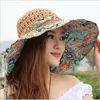 Fashion Sun Hat For Women Holiday Beach Straw Female Hollow Printed Bow Summer Big Brim Fold Uv Protection Floppy 2203128183092