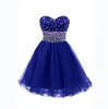 Sexiga Sweetheart Ärmlös Homecoming Klänningar Beaded En Linje Ruffles Tulle Short Cocktail Dress Party Gowns