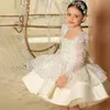 Abiti da ragazza di fiori con paillettes bianchi glitterati Maniche lunghe Compleanno Invitato a un matrimonio Robe De Demoiselle Comunione da principessa