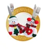 クリスマスディナーテーブルマットカトラリーフォークナイフホルダーケースパッド雪だるまサンタクロースナイフフォークバッグのための装飾