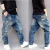 Heren jeans splitsen denim broek hiphop harem heren losse baggy broek hoge kwaliteit joggers straat stijl