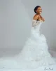 2022 Magníficos vestidos de novia de sirena fuera del hombro Manga larga Escote Vestido de novia Volantes Tren de barrido Apliques de encaje Por encargo vestido de novia