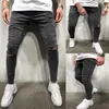 Męskie dżinsy 2021 Mężczyźni Skinny Ripped Hole Biker Drelich Spodnie ołówkowe Czarny Niebieski Zniszczony Frayed Fit Jean Slim Streetwear Spodnie