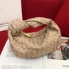 Toppkvalitetsdesigner hobo axelväska för kvinnor intrecciato vävd bröstpaket dam tote rundade läder handväskor vintage knuten h340n