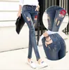 Novas calças jeans de lábios rasgadas buraco senhoras elásticas skinny lápis Pantsembroidy Lips carta jeans calças para mulheres 201109