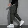 Spodnie taktyczne Mężczyźni Milp-kieszeni umyte kombinezony męskie luźne 100% bawełniane spodnie ładunków męskie joggery spodnie mody mody na dno 201128