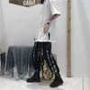 Pantalon Harajuku Femmes Taille élastique Mode Caractères chinois imprimés Pantalon de longueur de mollet en vrac 201106