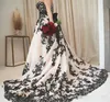 Vintage gotiska svartvita bröllopsklänningar 2021 plus storlek axellös svep tåg korsett country western cowgirl wedding gown248k