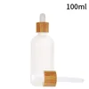 Frosted Glass Essential Oil Droper Bottle Refillable Makeup Exempel Kosmetisk lagringsbehållare med bambu cap7718513