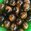 1 stks Tiger Eye Zeldzame Natuurlijke Carving Sphere Ball Free Stand Chakra Healing Reiki Stones Gesneden Ambachten Groothandel T200117