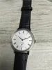 Montre classique mécanique à mouvement de vent à main, montre-bracelet pour homme et femme, en acier inoxydable, cadran blanc, bracelet en cuir2874