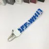 Off -keychain OW شفاف PVC Jelly Letters Jeals Mobile Phone Camera Bet Pendant White 3R9Q83394614