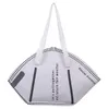 PB0007 Fashion شخصية الوجه الإبداعي مصمم أكياس الكتف حقيبة يد كبيرة السعة التسوق حقيبة أسود أبيض 2 ألوان 233s