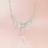 Angel Wing قلادة قلادة المرأة المقاوم للصدأ الطيور مجوهرات أول شركة هدية بيان chocker انخفاض الشحن