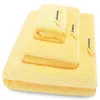 toalha de banho define amarelo
