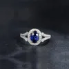 Ainuoshi 1.25 Carat Oval Corte Azul Sona Bridal Halo Anéis 925 Sterling Prata Mulheres Noivado Aniversário Aniversário Presentes Y200106