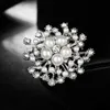 Gouden sneeuwvlok broche diamant parel corsage broches sjaaljurk zakelijke pak gespinnen voor vrouwen mode sieraden wil en zandgift