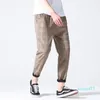 メンズパンツ男性女性韓国風黒格子縞カジュアル2022メンズストリートウェアハーレムオス市松模様のズボンプラスサイズ4xl