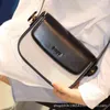 Jiaqi는 2021 년 새로운 굴착을 추천합니다. 똑같은 귀장 가방 수평 싱글 어깨 대각선 여성의 틈새 디자인