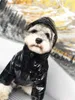 Ropa de pan engrosada de invierno para mascotas Abrigo cálido para perros Púrpura y negro Abrigo para mascotas con cara brillante Sudaderas con capucha Chaqueta S-2XL con bordado Trim284y