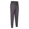 L36 Vävt fickan Yoga byxor Lossa joggar snabbt torkande elastisk löpning fitness sport casual gym kläder dragkvinnor legging7830555