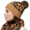 Les femmes hiver chaud Bonnet tricoté Cuffed Vintage Leopard Pompon Calotte