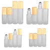 Glasklare gefrostete leere Flaschen 5 ml 10 ml Metallrollerkugel Holzmaserung Kunststoffparfümflasche Tragbare Fläschchen Reise Neuankömmling 2js G2