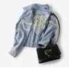 Giacca di jeans impreziosita da perle da donna Giacca vintage azzurra Cappotto con perline ricamate Autunno Inverno Outwear 21114