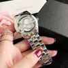 ブランドの時計女性の女性の女の子ダイヤモンドクリスタルトライアングル中空アウト大きな文字スタイルのメタルスチールバンドクォーツ腕時計人気ギフトデザイナー