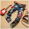 Jeans pour hommes Patchwork Denim bleu Locomotive pantalon broderie beauté Badge Cool élégant Design maigre droit mince 29-381