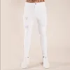 Мужские джинсы мужские сплошные цвета 2021 мода тонкий карандаш брюки сексуальные повседневные отверстия разорванные дизайн мужчины уличная одежда хип-хоп