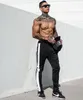 2022 nouveauté hommes couleur correspondant Joggers pantalon pour la mode en plein air course Fitness pantalons de survêtement homme cordon sport pantalon X-19-CK331